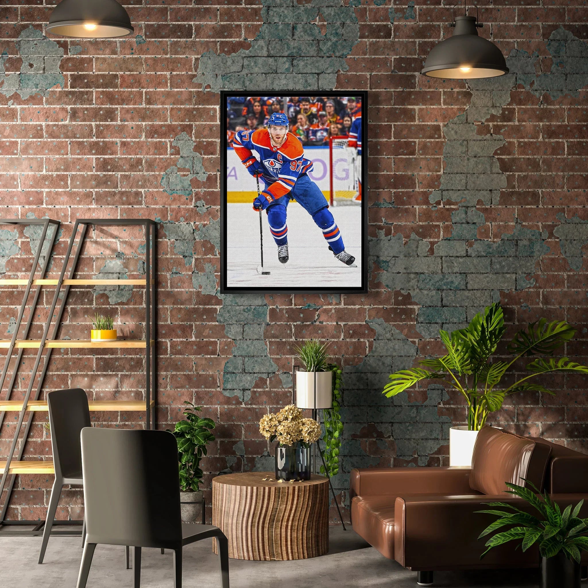 Hockey player wall art in modern loft living room with exposed brick and plants