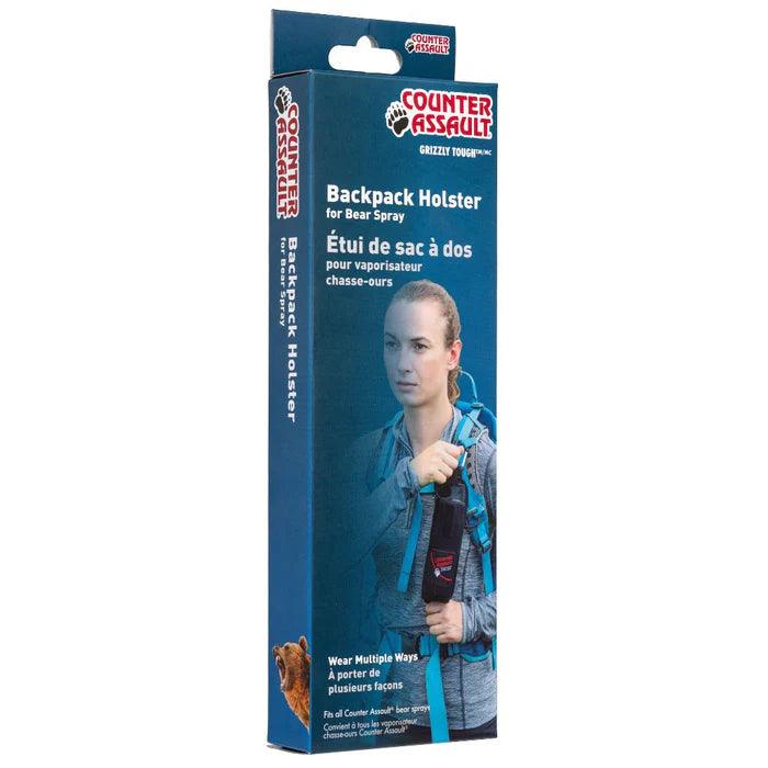 Counter Assault backpack holster for bear spray retail package with woman on box
