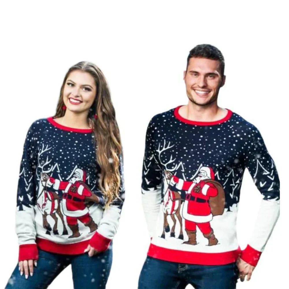Couple in matching Christmas sweaters with Santa and reindeer snow scene