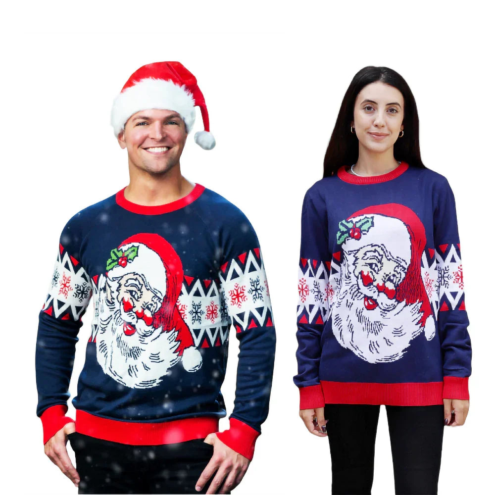 Two people in navy Christmas sweaters with vintage Santa and snowflake patterns
