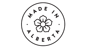 Made in Alberta badge with flower logo, black and white circular design