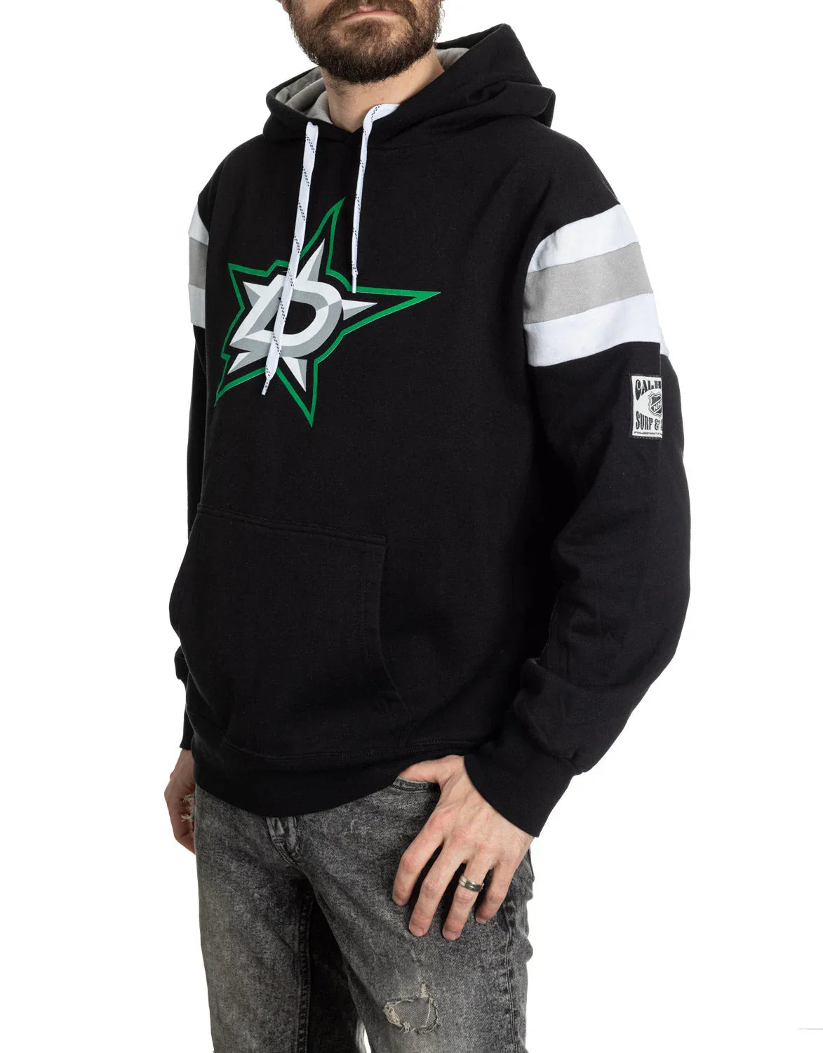 Man wearing black Dallas Stars varsity hoodie with logo and striped sleeves