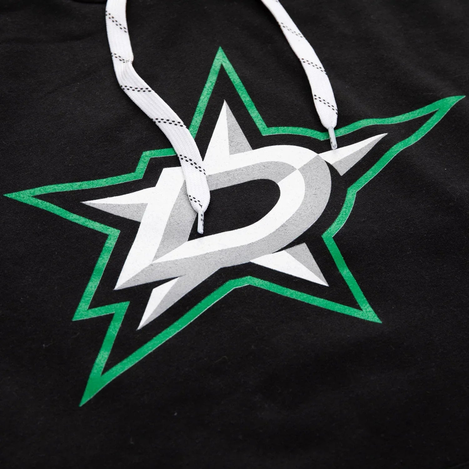 Dallas Stars logo detail on black varsity hoodie with white drawstrings