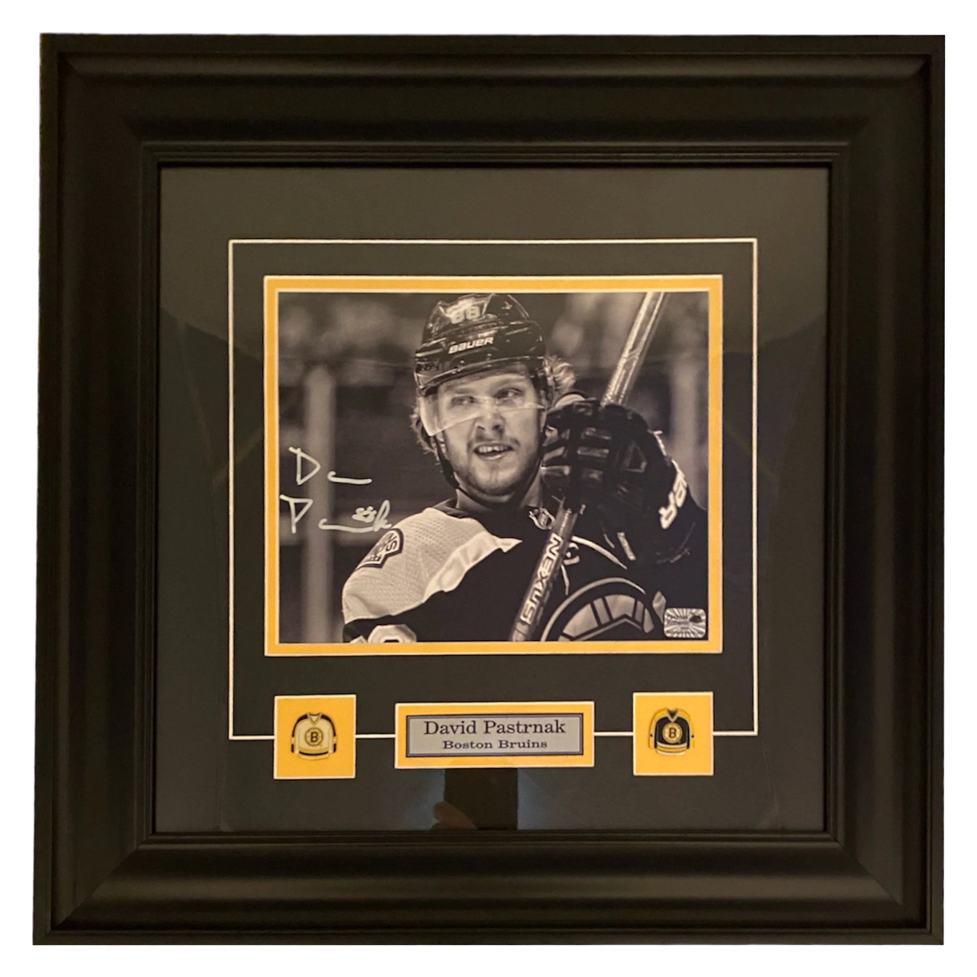 Framed signed David Pastrnak Boston Bruins hockey photo with team logo plaque