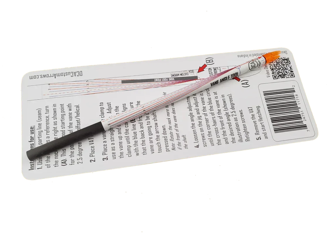 Archery vane angle tool with black handle placed on instruction card and barcode