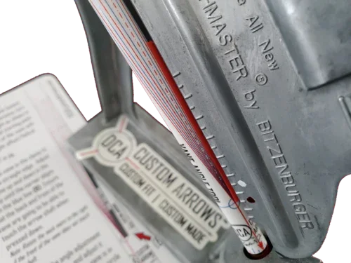 Bitzenburger fletching jig aligning a custom arrow with instruction card