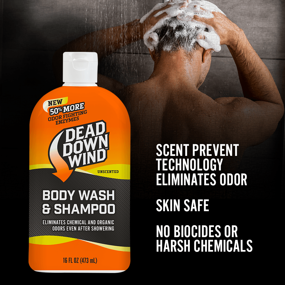 Dead Down Wind body wash and shampoo bottle with a person washing hair in the shower