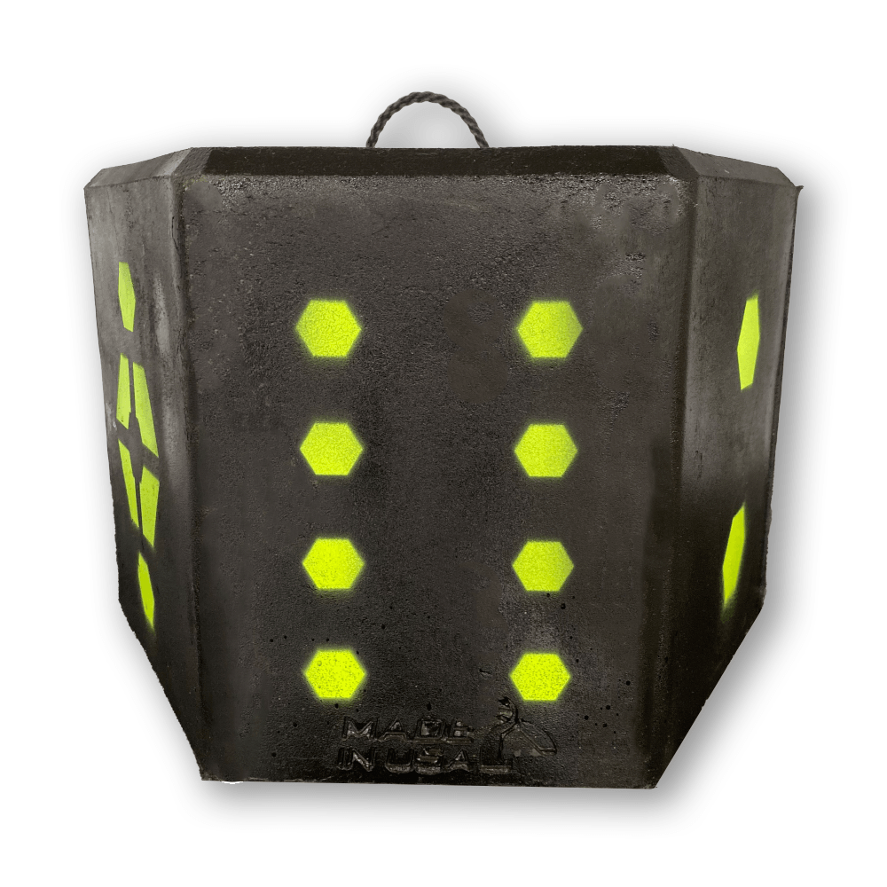 Black archery target block with yellow hexagon aiming spots and top handle