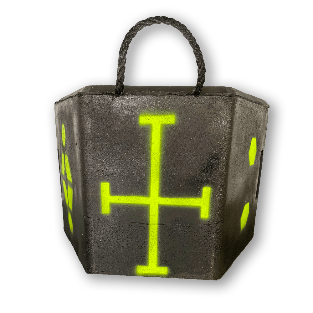 Black concrete block with neon yellow cross symbols and rope handle, fitness equipment