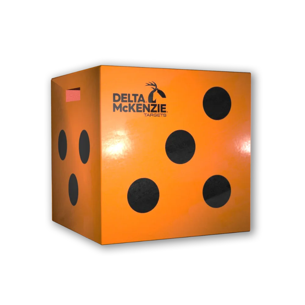 Delta McKenzie orange archery target block with black dots on black background