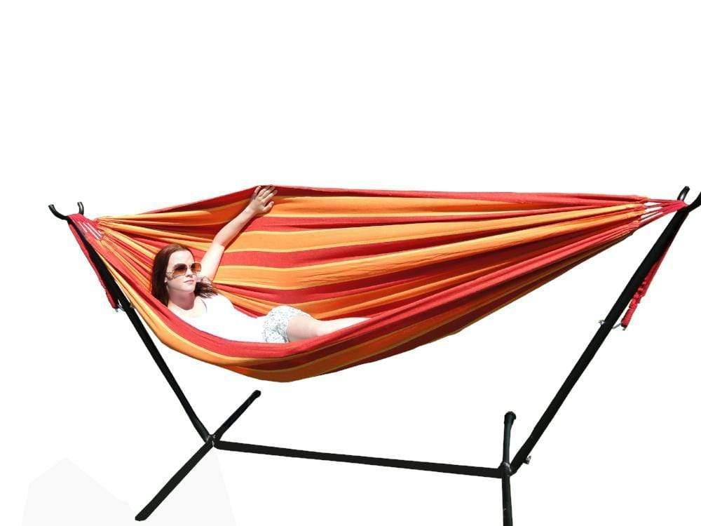 Red orange yellow striped double hammock with stand, woman relaxing, isolated background