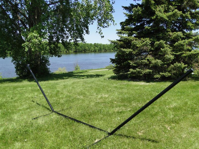 15-foot tri-beam hammock stand for spreader bar hammocks on grass near lake and trees