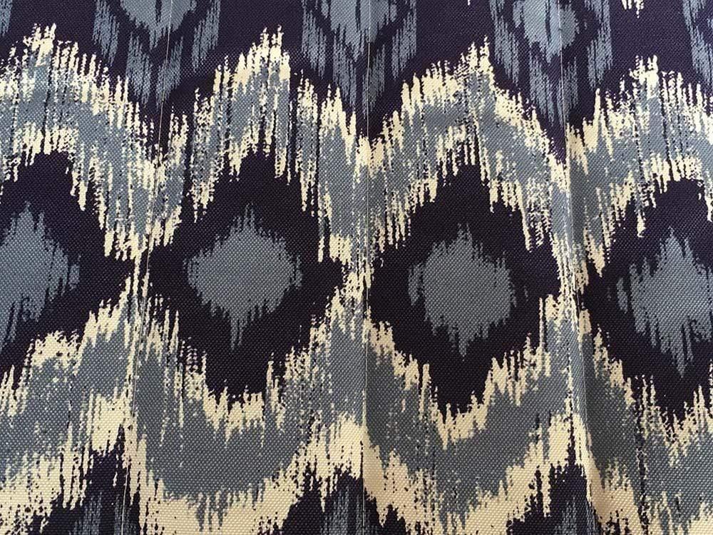 Blue and white quilted hammock fabric with geometric diamond patterns