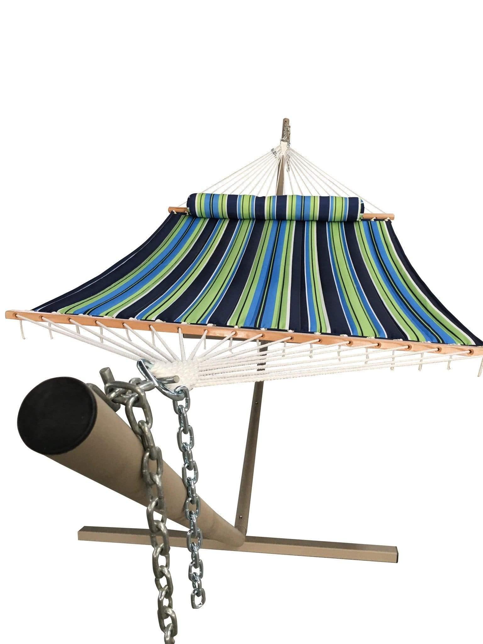 Quilted blue striped hammock with pillow on metal stand, outdoor relaxation furniture