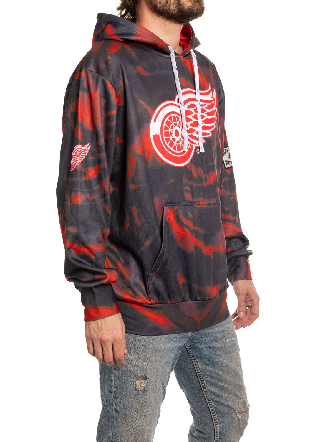 Detroit Red Wings tie-dye sublimation hoodie on man in jeans, side view