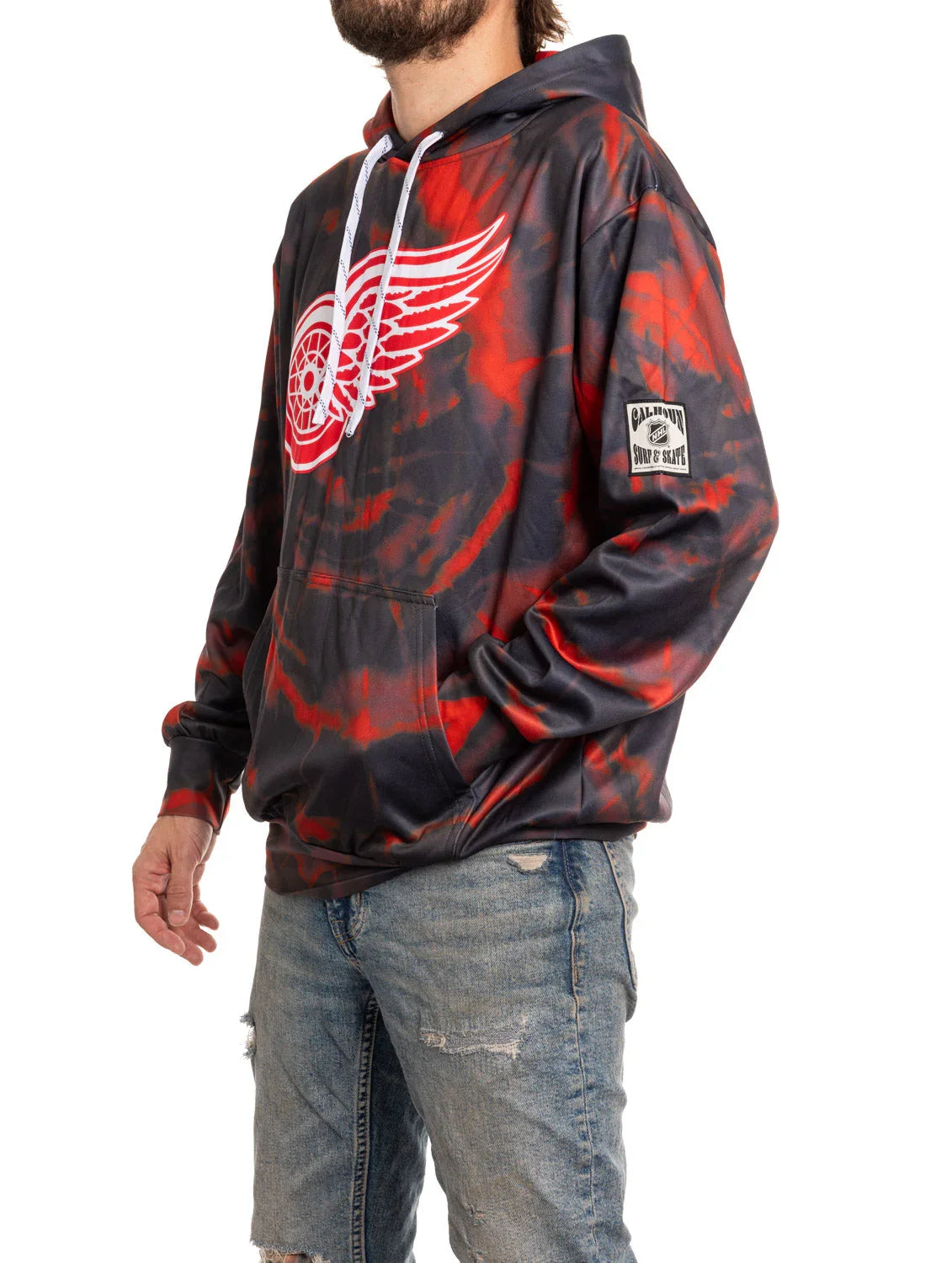 Detroit Red Wings red and black tie-dye sublimation hoodie with patch, worn by man in jeans