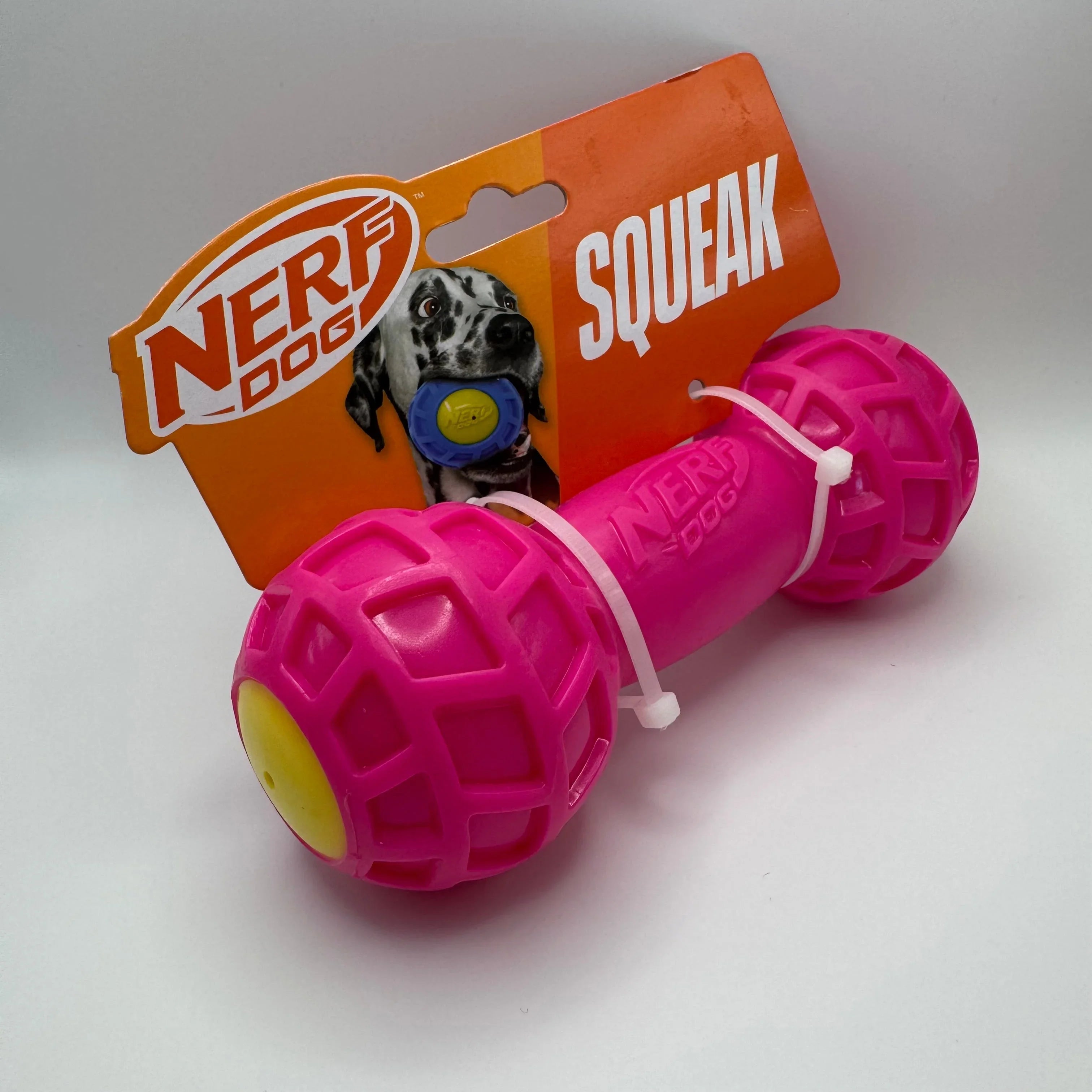 Nerf Dog pink squeak chew toy for dogs with packaging and Dalmatian image