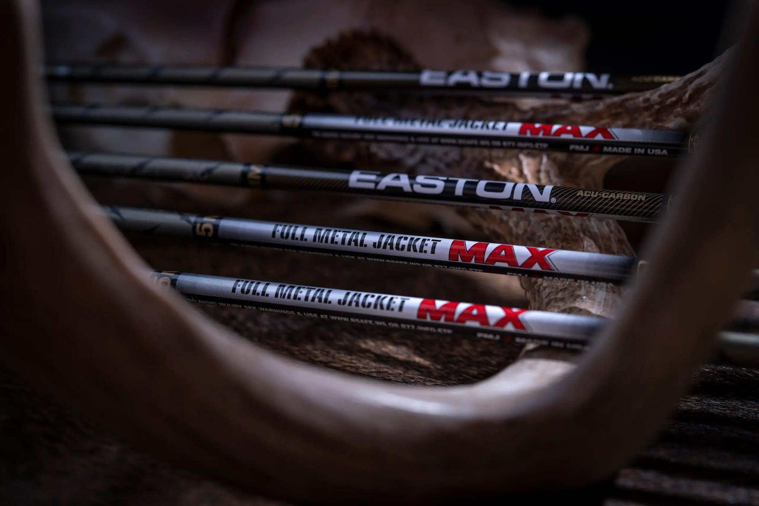 Easton Full Metal Jacket MAX carbon arrows arranged on antler background, archery equipment