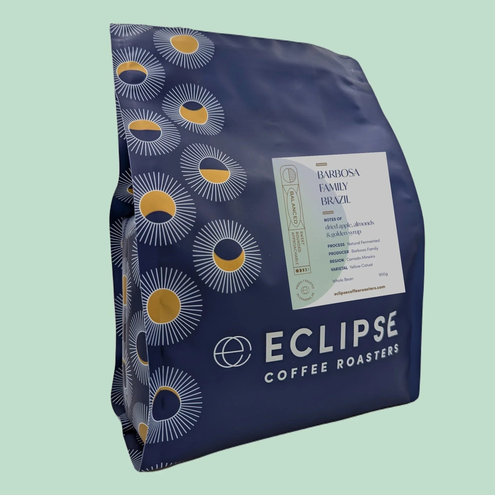 Eclipse Coffee Roasters Barbosa Family Brazil 950g bag with blue and gold sunburst design
