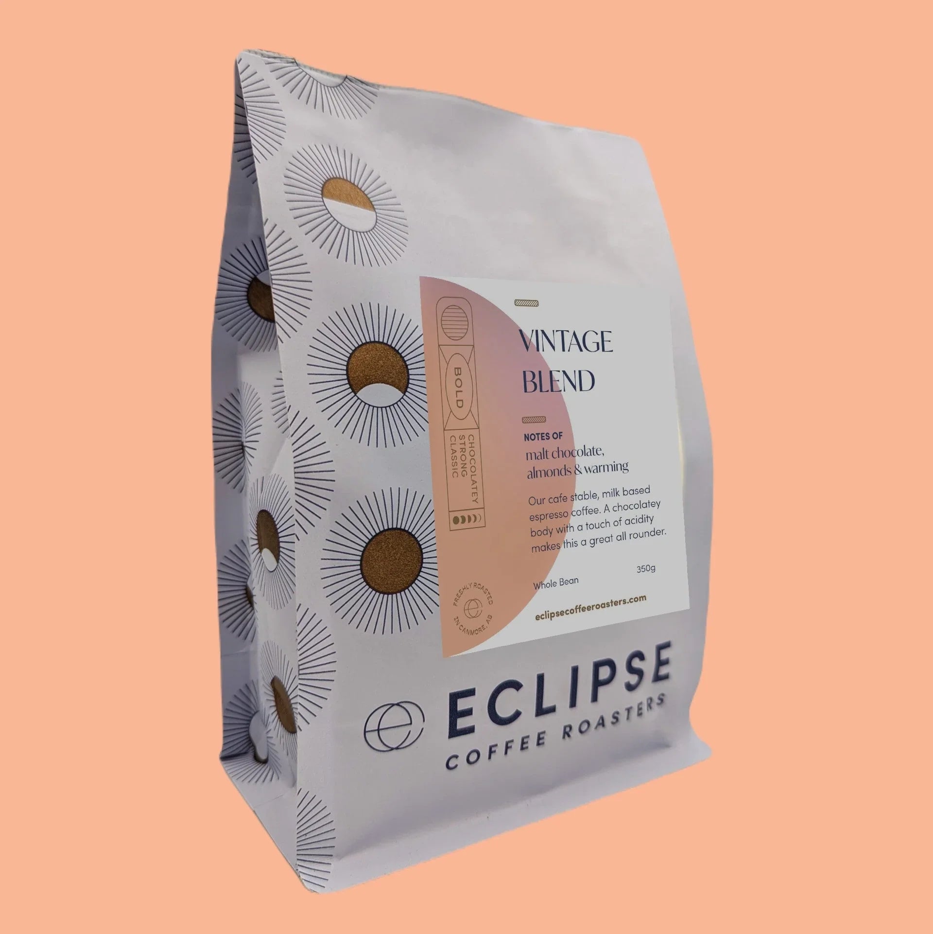 Eclipse Coffee Roasters Vintage Blend 350g bag with bold sunburst pattern on peach background