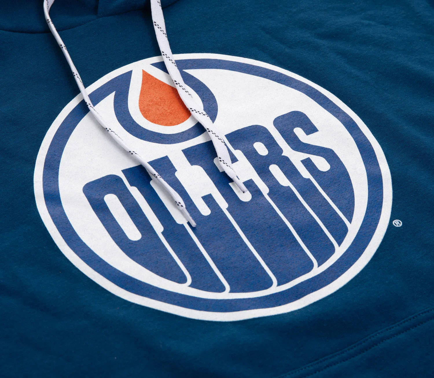 Blue hoodie with Edmonton Oilers varsity logo and white drawstrings