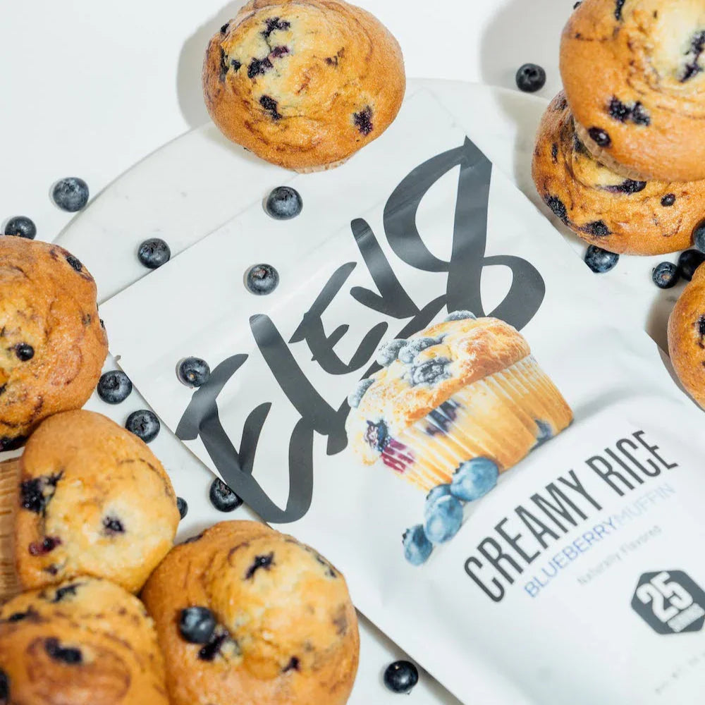 Elev8 Creamy Rice Blueberry Muffin protein powder with fresh blueberry muffins