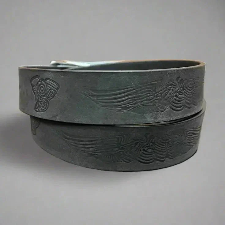 Men's black leather belt with embossed engine and eagle wing designs, removable buckle