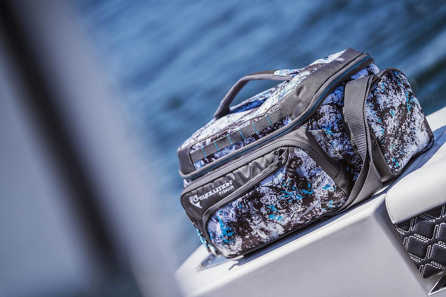 Camouflage tackle bag with handles on a boat, blue water in the background, fishing gear accessory