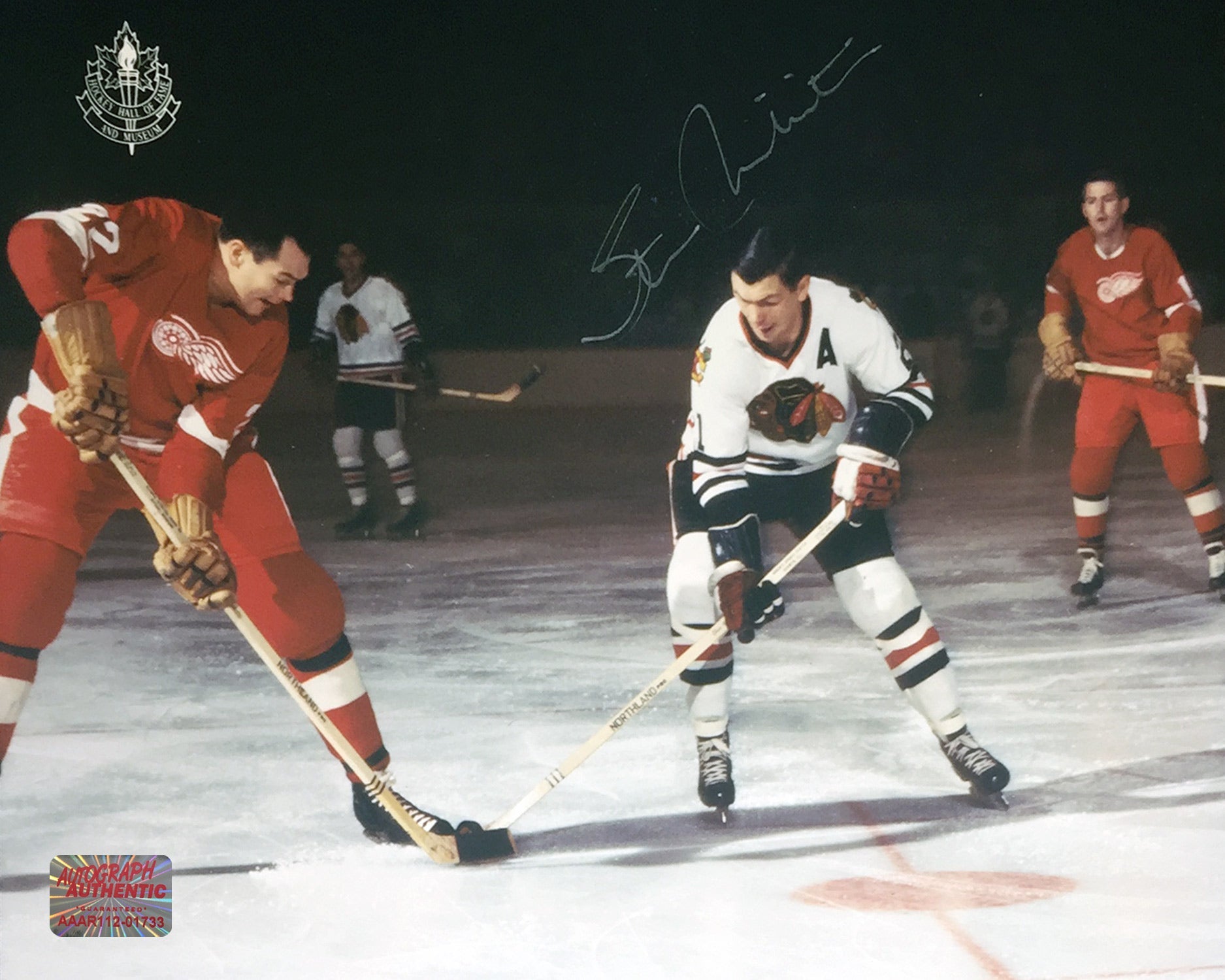 SIGNED STAN MIKITA 8X10 FACEOFF PHOTO - CHICAGO BLACKHAWKS