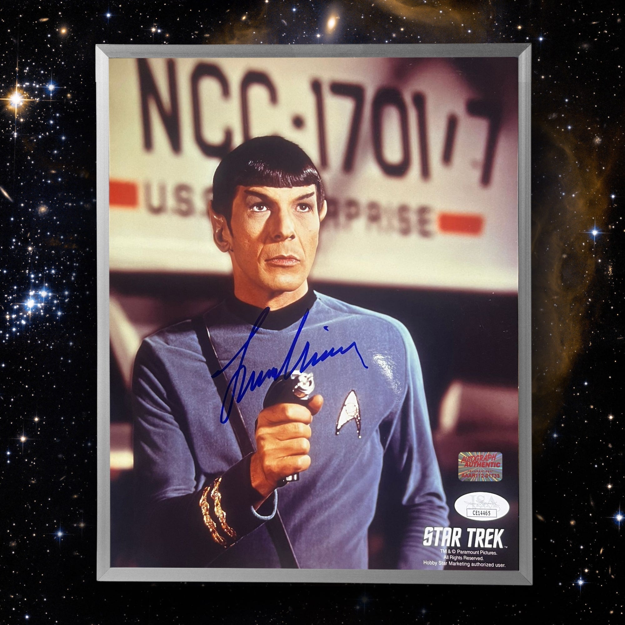 LEONARD NIMOY AUTOGRAPHED STAR TREK PHOTO - SPOCK WITH PHASER 8X10