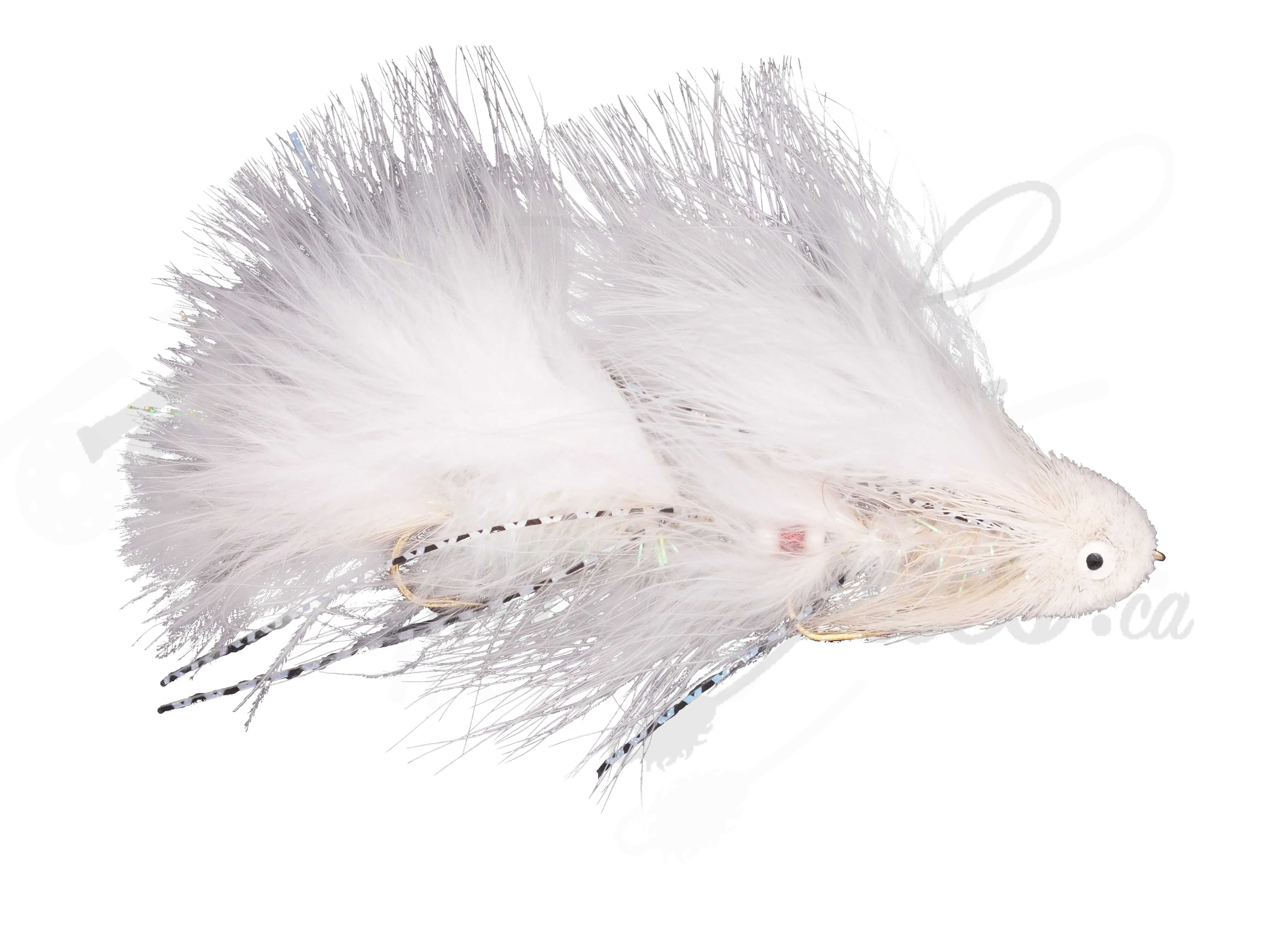 White articulated streamer fly fishing lure with marabou feathers and flash accents