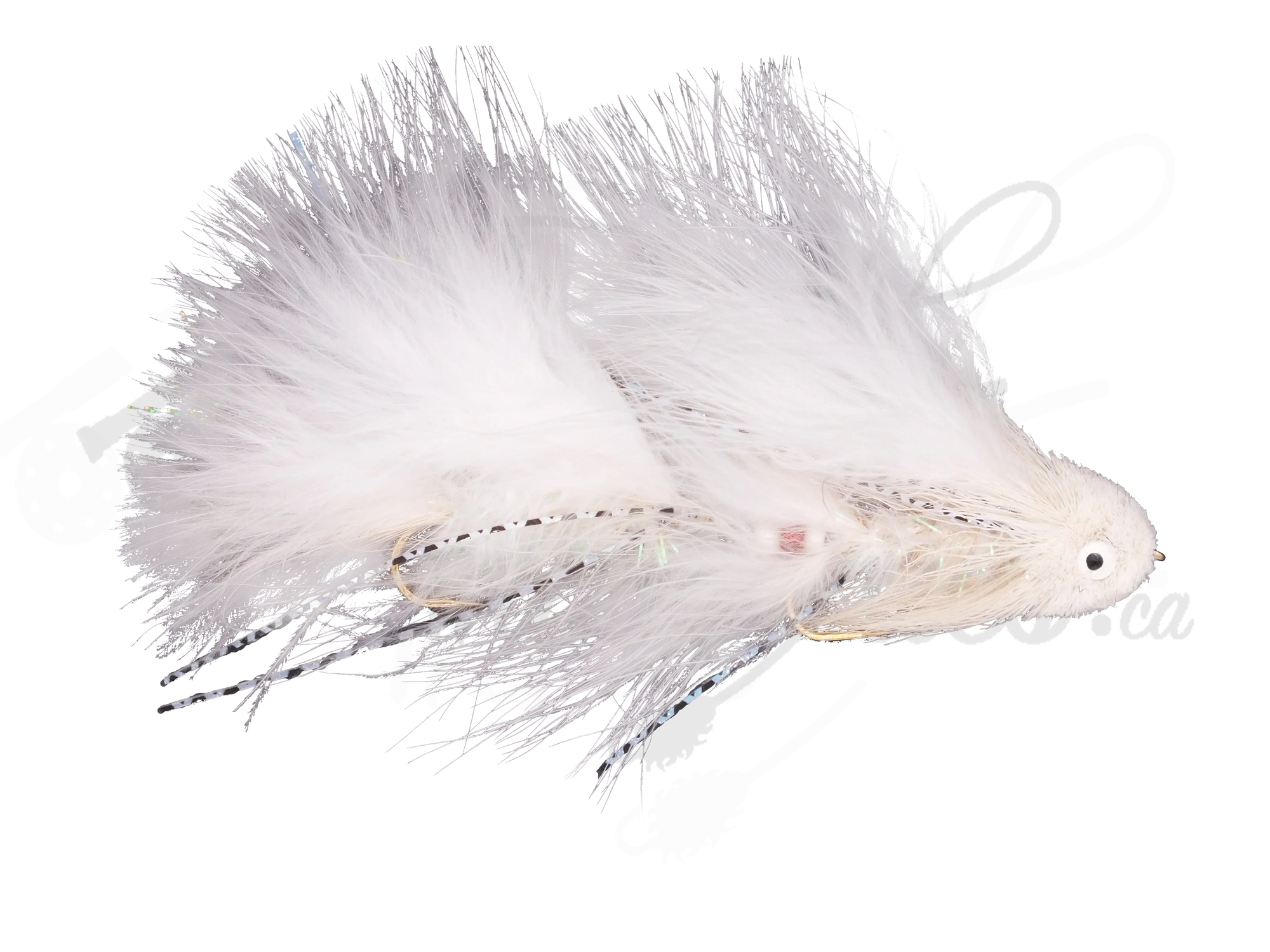 White articulated streamer fly fishing lure with marabou feathers and flash accents