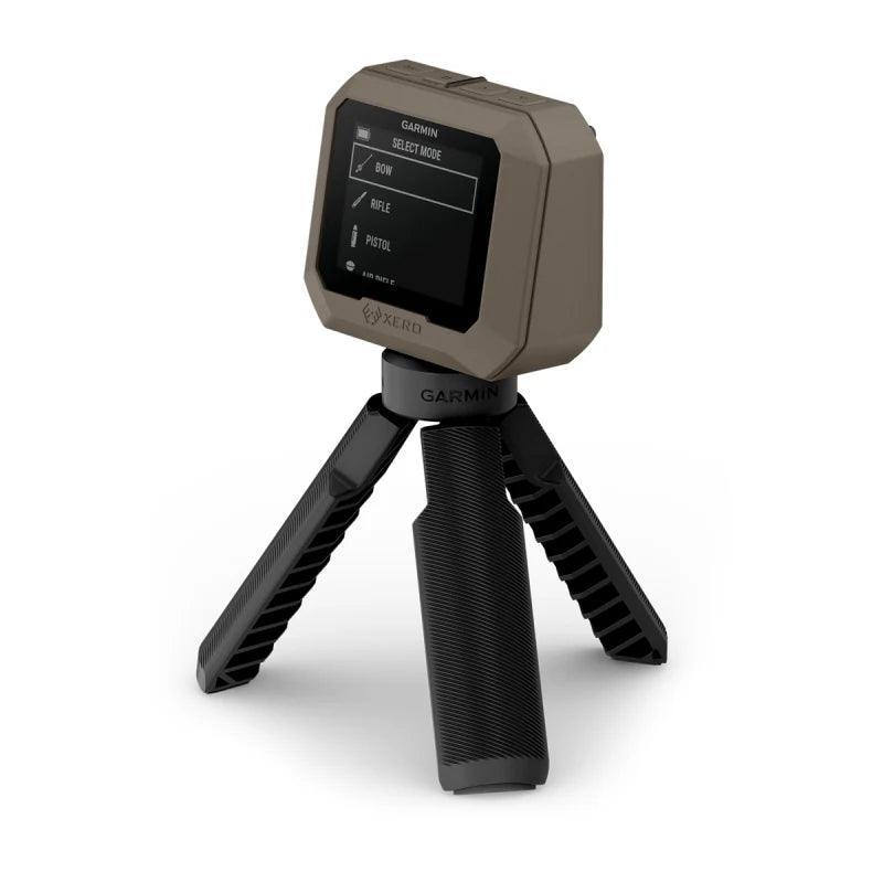 Garmin Xero C1 Pro chronograph on tripod, display showing bow, rifle, pistol modes