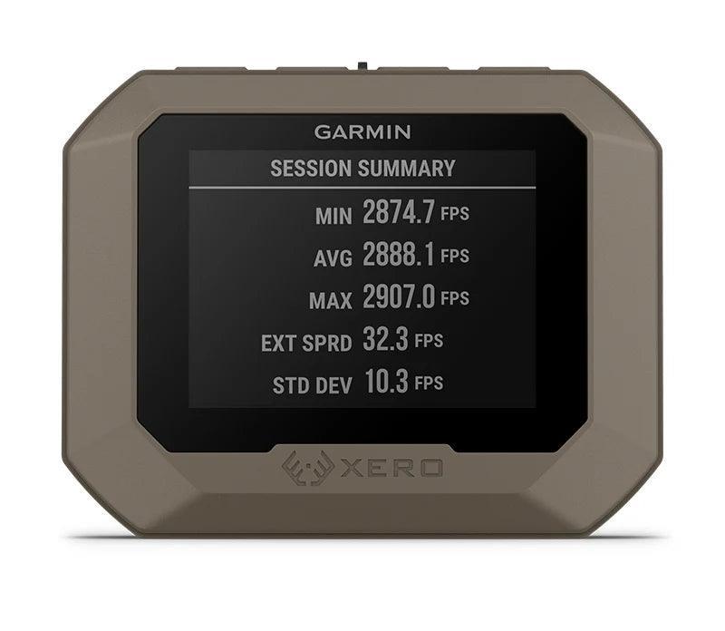Garmin Xero C1 Pro chronograph displaying session summary FPS stats on screen.