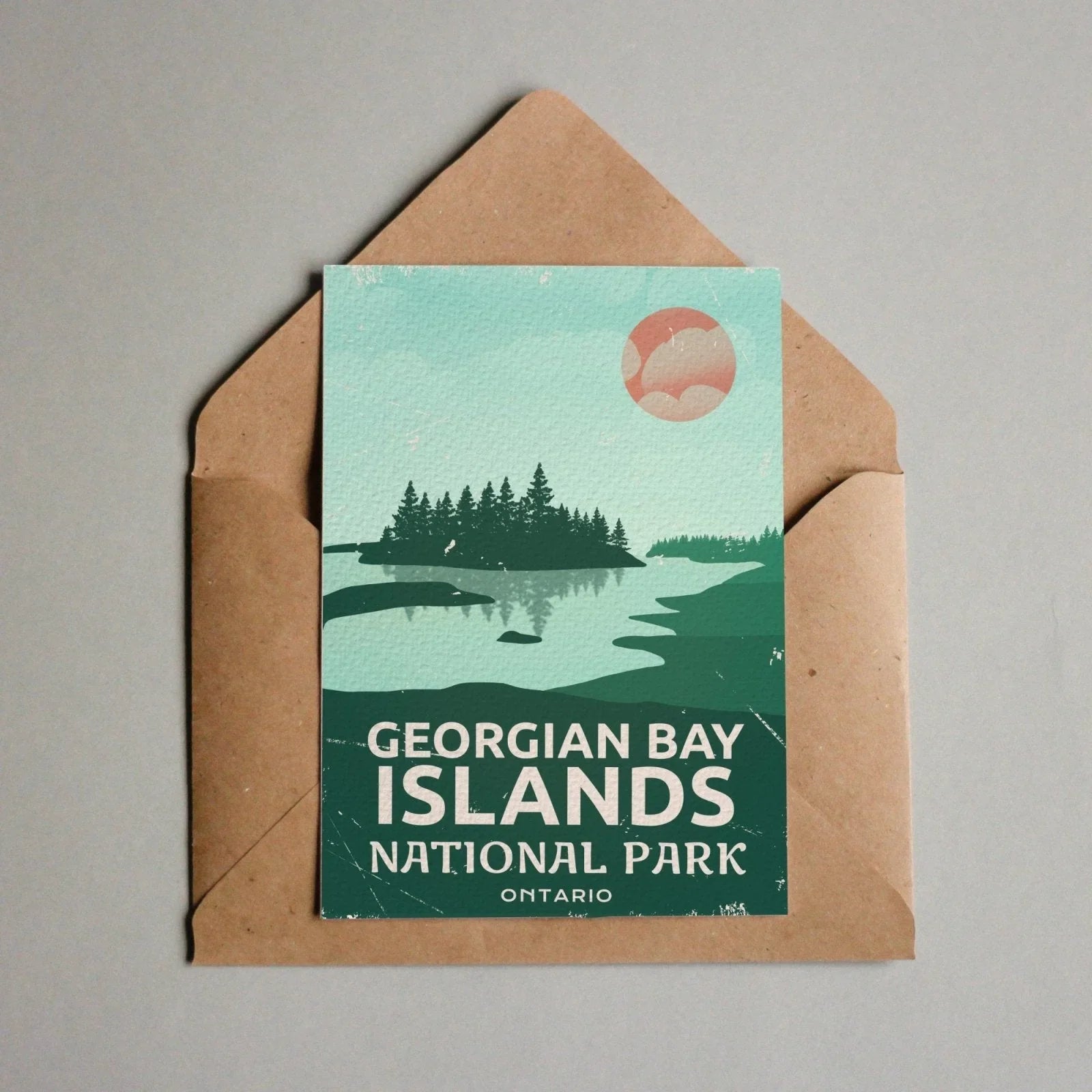 Georgian Bay Islands National Park Ontario postcard with illustrated lake, trees, and sunset.