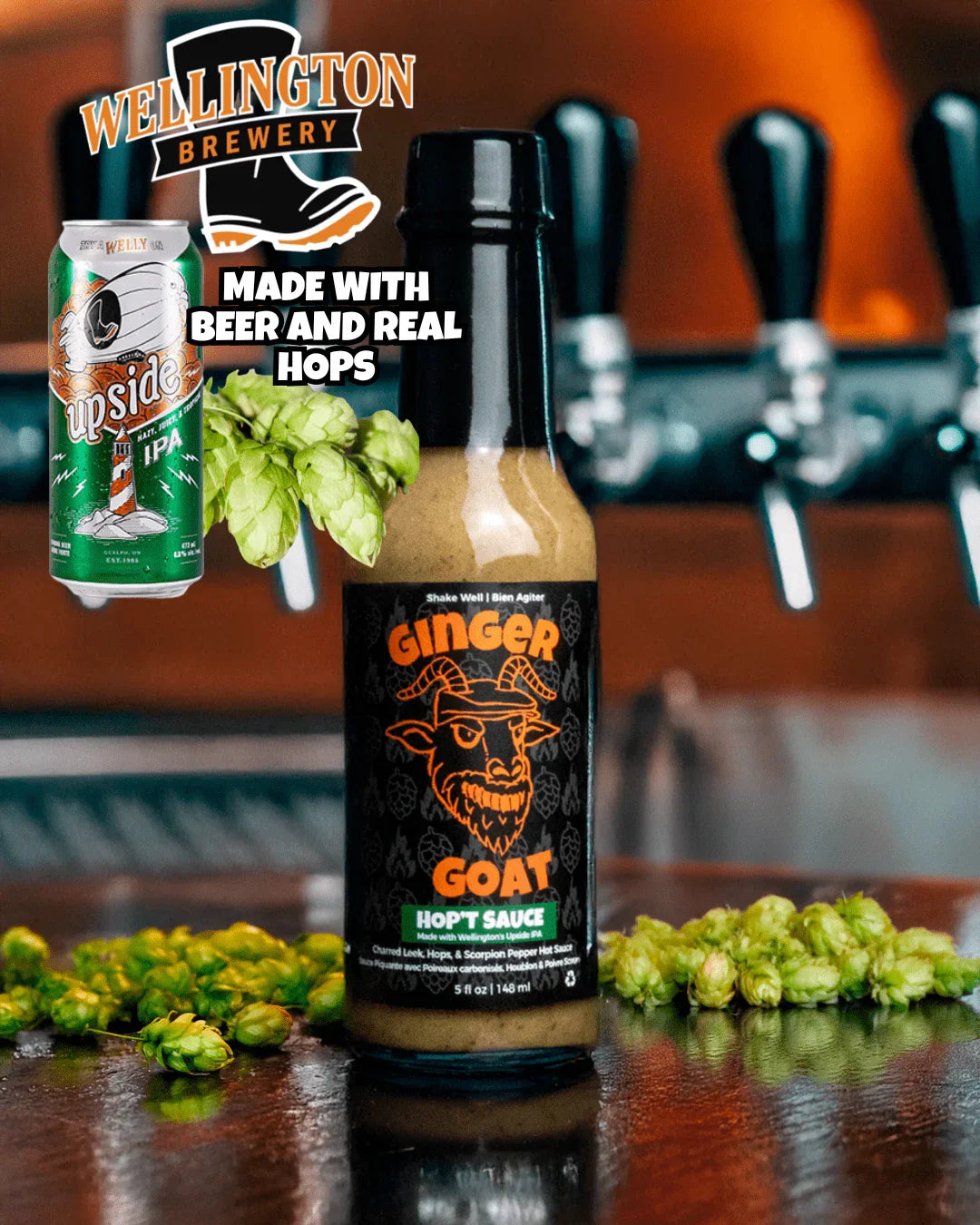 Ginger Goat Hop't Sauce hot sauce bottle with IPA beer can, hops, and Wellington Brewery logo