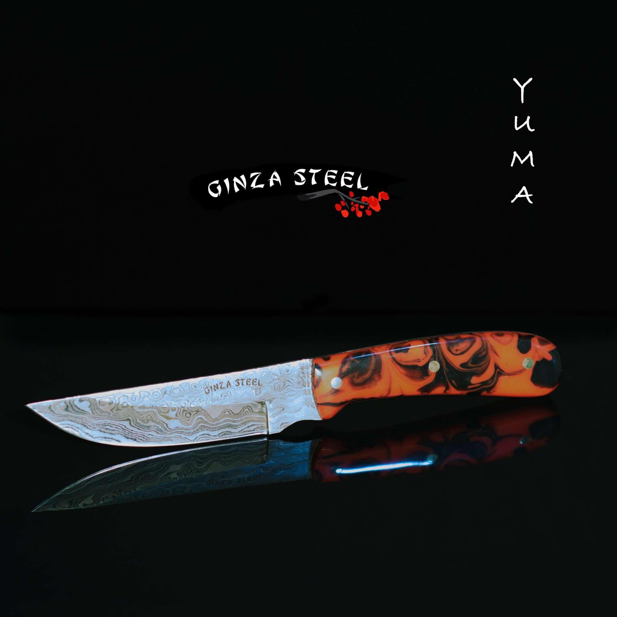 Ginza Steel Yuma knife with Damascus blade and orange patterned handle on black background
