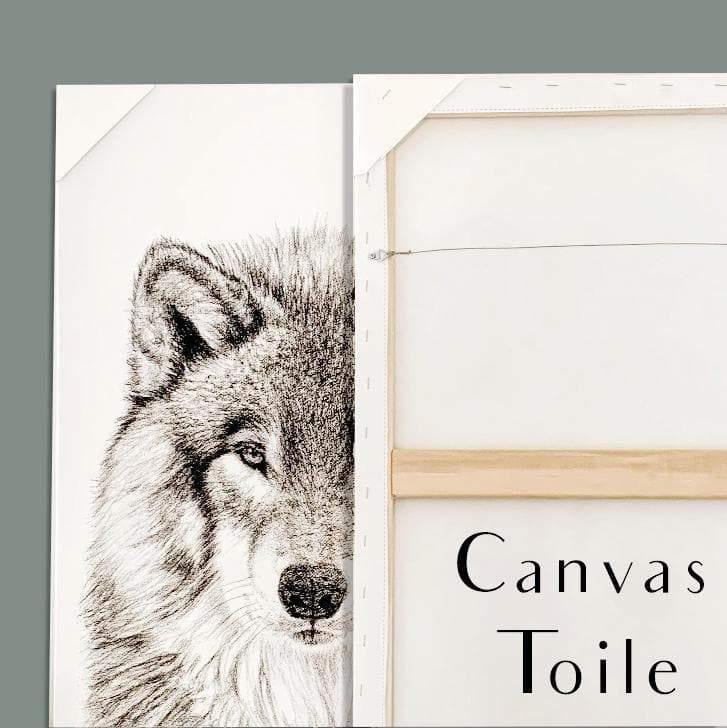 Wolf sketch canvas wall art beside the back of a blank canvas on a grey background