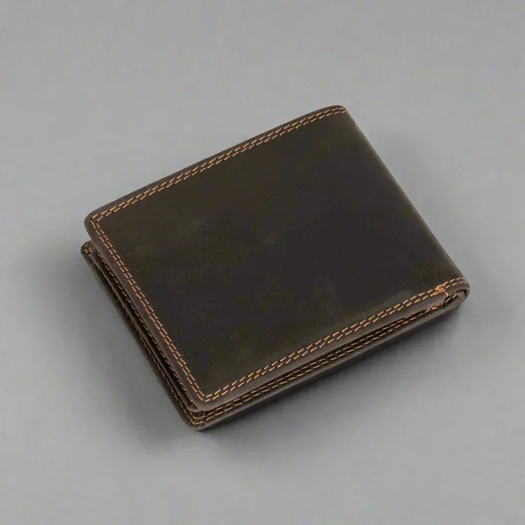 Dark brown leather wallet with contrast stitching on a gray background