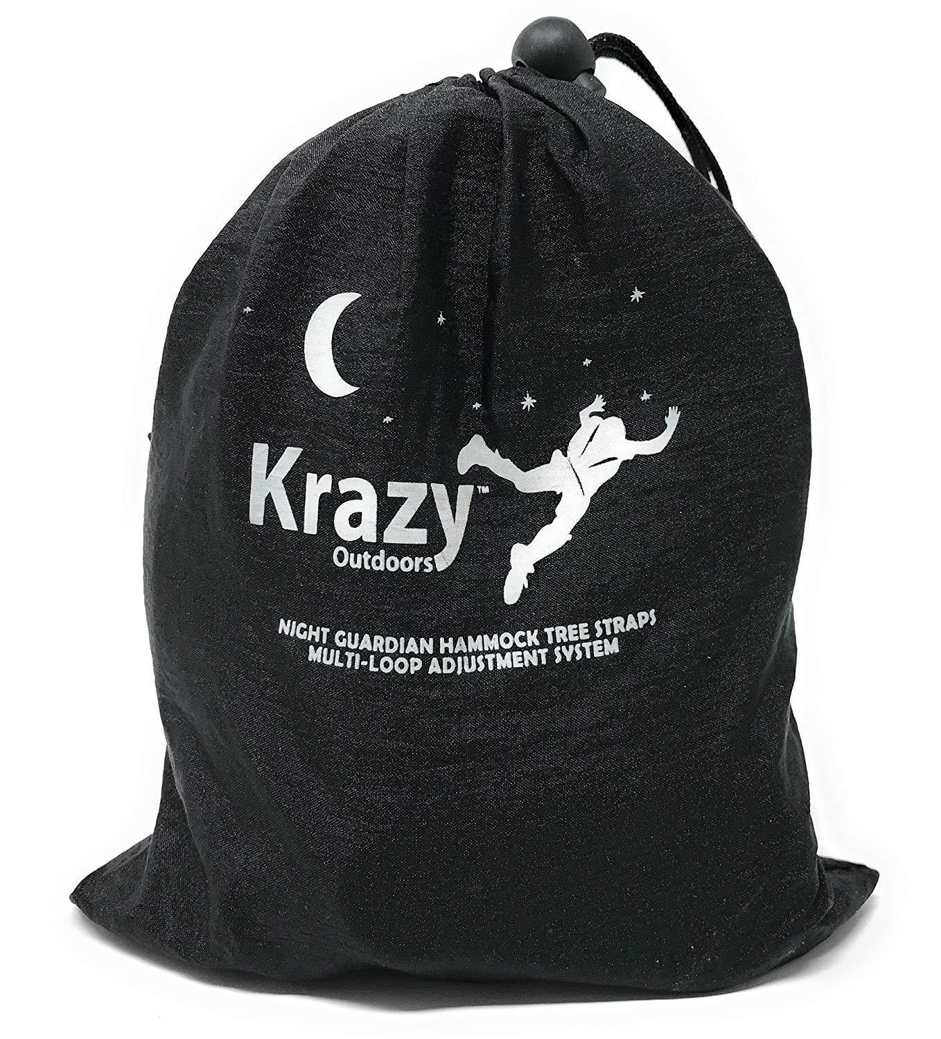 Black drawstring bag labeled Krazy Outdoors Night Guardian hammock tree straps multi-loop adjustment system, with moon and stars graphic.