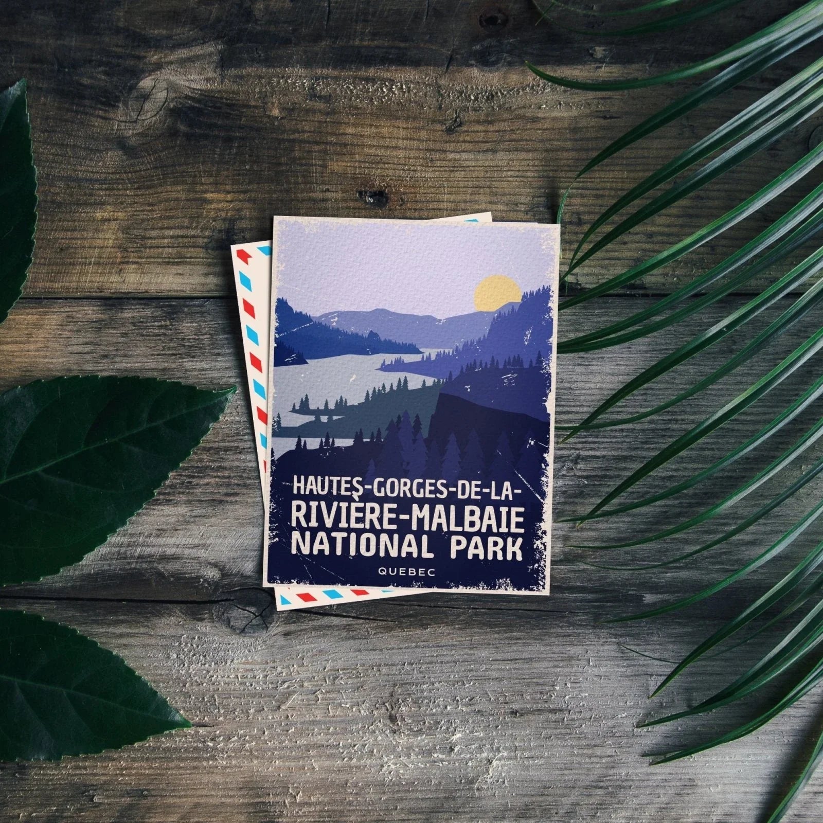 Quebec Hautes-Gorges-de-la-Rivière-Malbaie National Park postcard on rustic wood with leaves