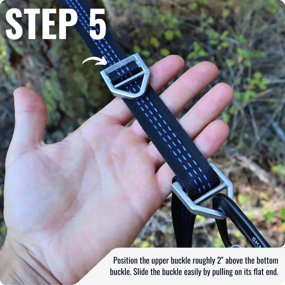 Hand adjusting buckle on black adjustable strap for outdoor setup, step 5 instruction