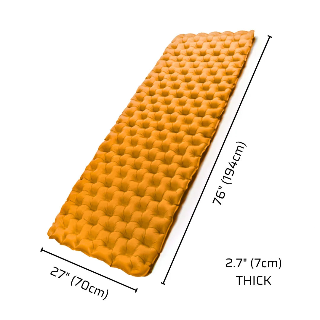 Orange inflatable camping sleeping pad with dimensions 76x27x2.7 inches shown on white