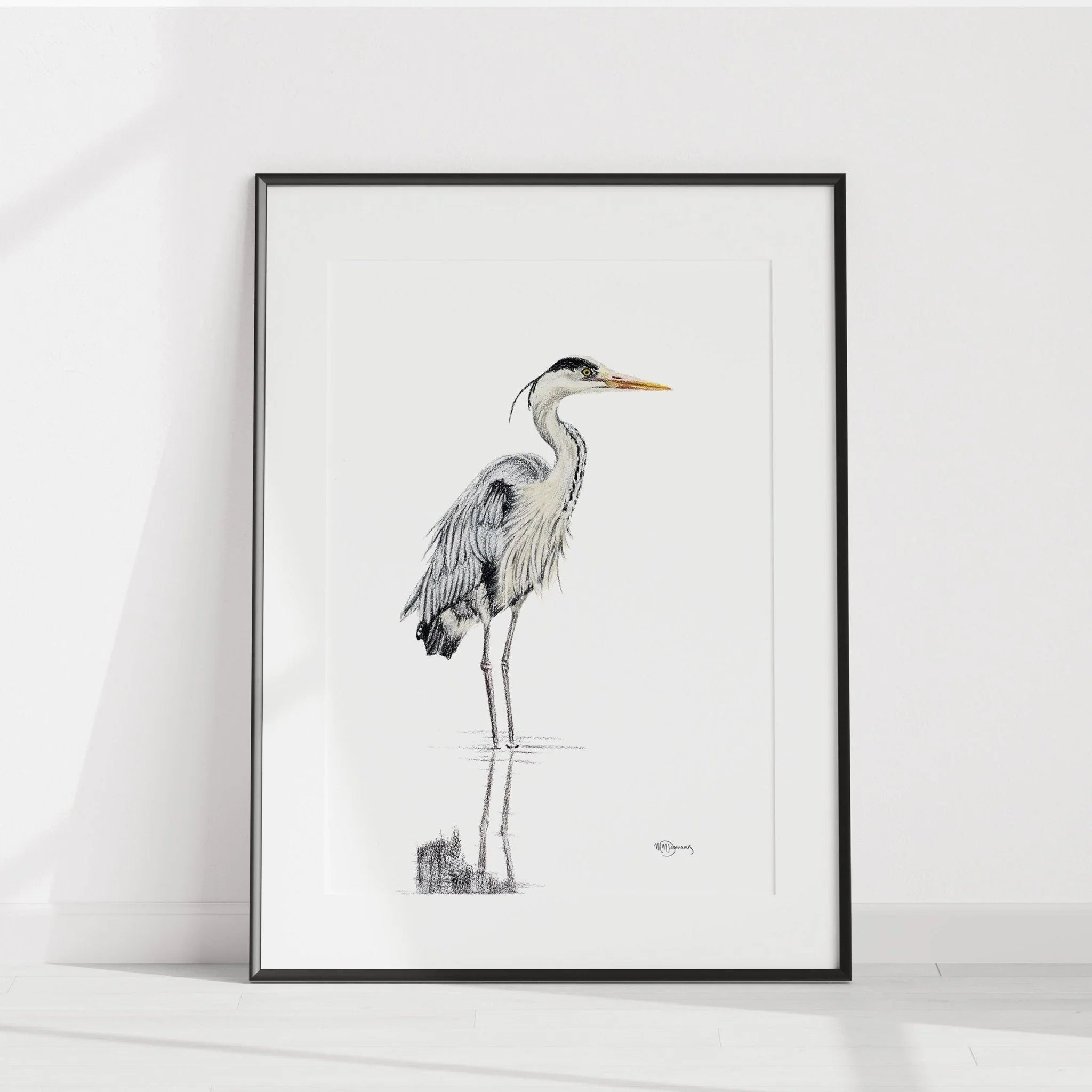 Great blue heron illustration in water, framed art print on a white wall
