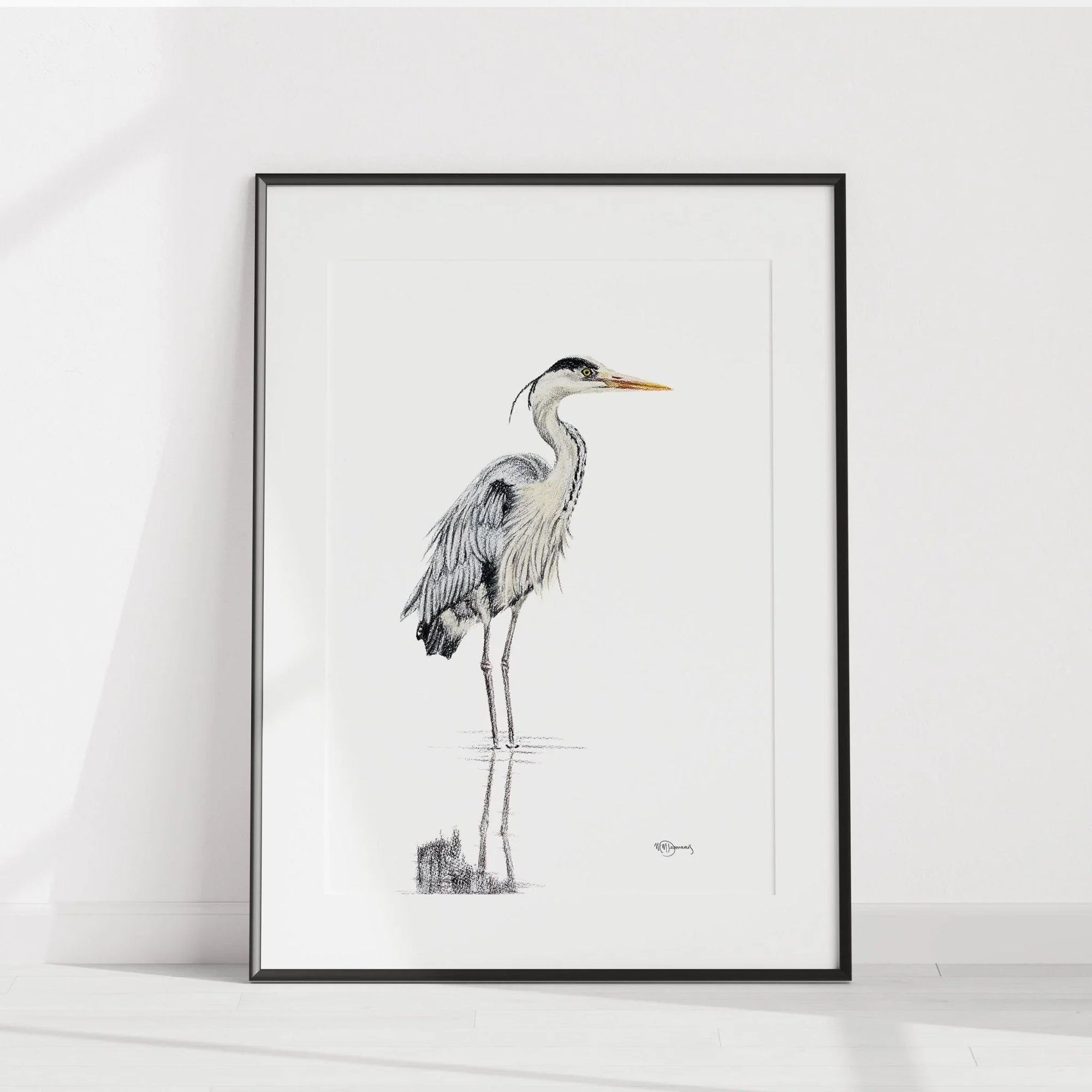 Great blue heron illustration in water, framed art print on a white wall