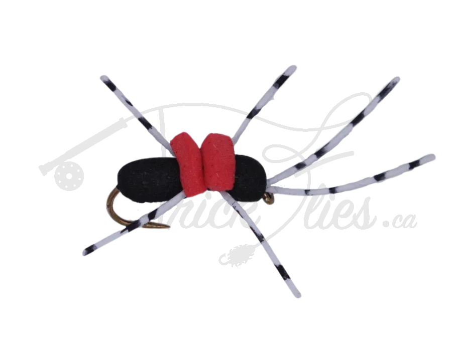 Hi-Vis foam ant black fly fishing lure with red foam body and striped legs on white background