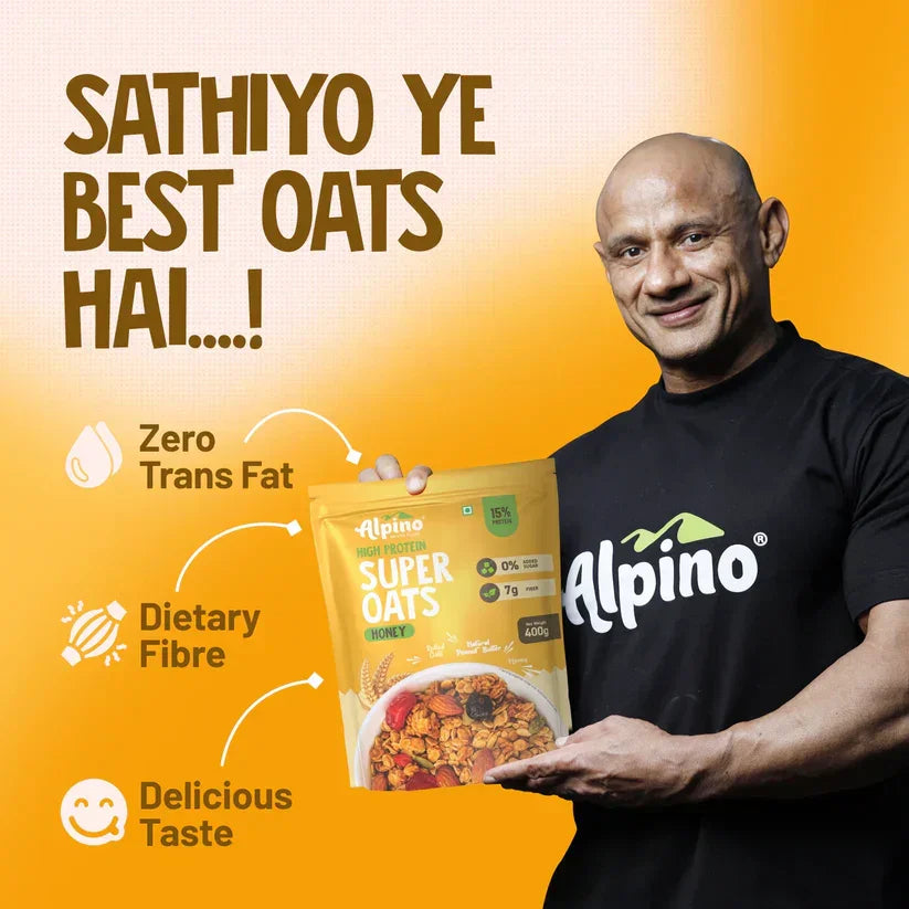 Man holding Alpino Super Oats Honey pack, highlighting zero trans fat, dietary fiber, and delicious taste.