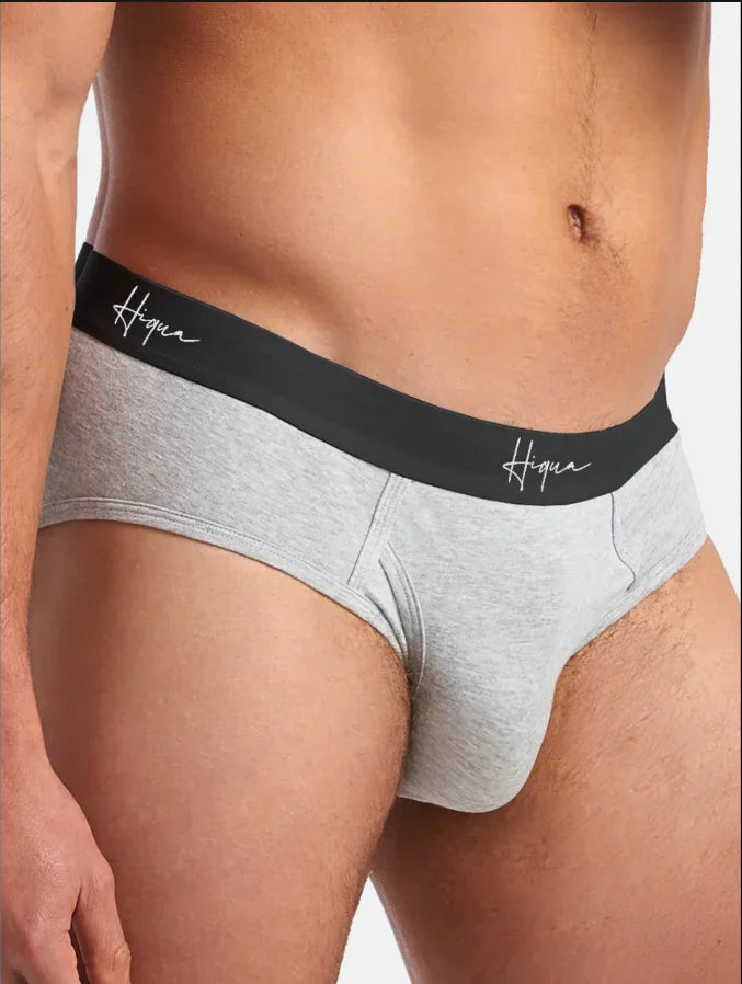 Male model wearing gray Hiqua briefs with black waistband