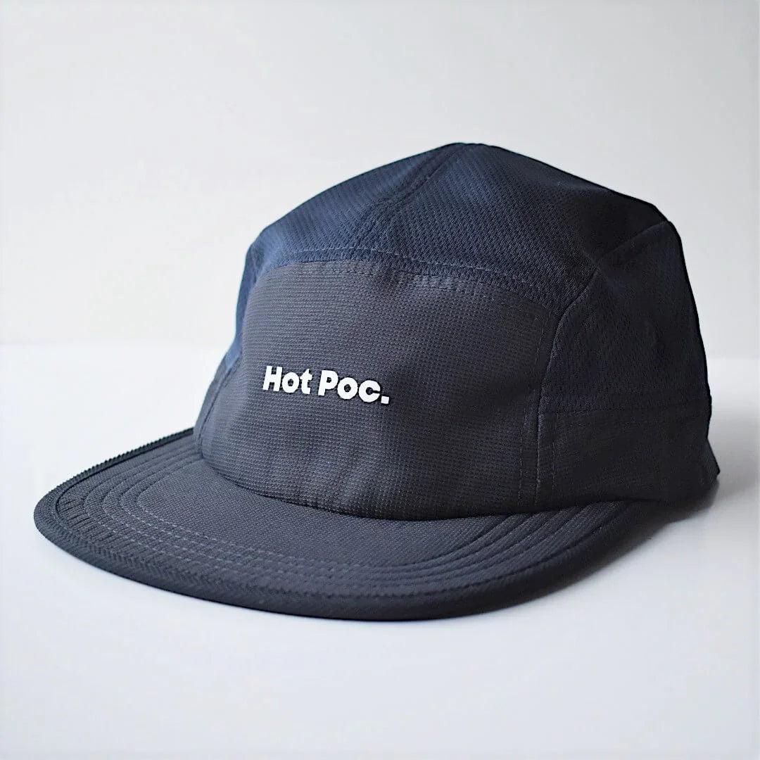 Navy blue Hot Poc. cap with white embroidered logo on plain background