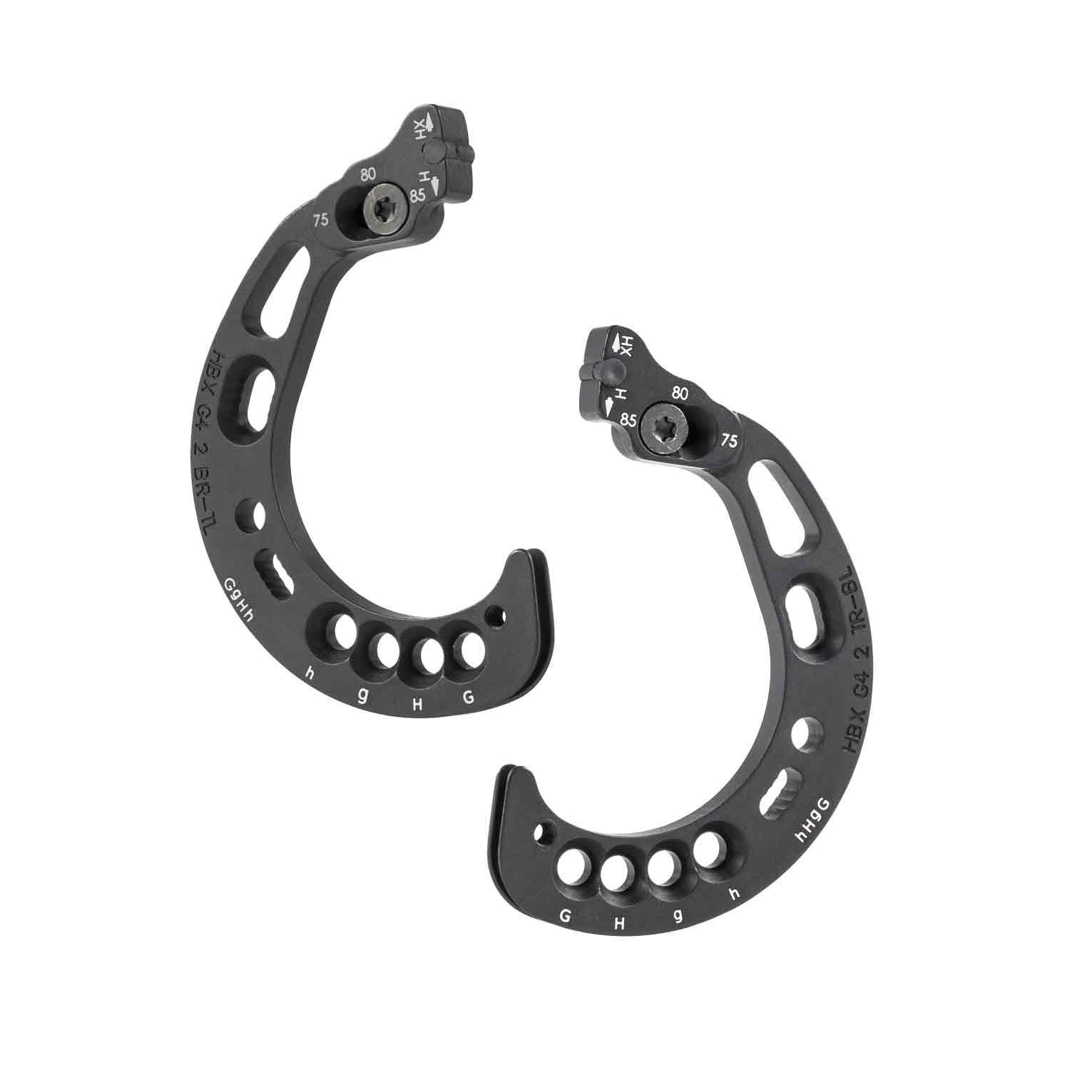 Pair of black aluminum HBX adjustable bicycle chain guides on white background